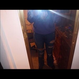 Women's Distressed Blue Jeans
